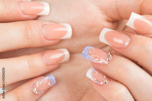 Принти на полотні Beautiful female hands with french manicure