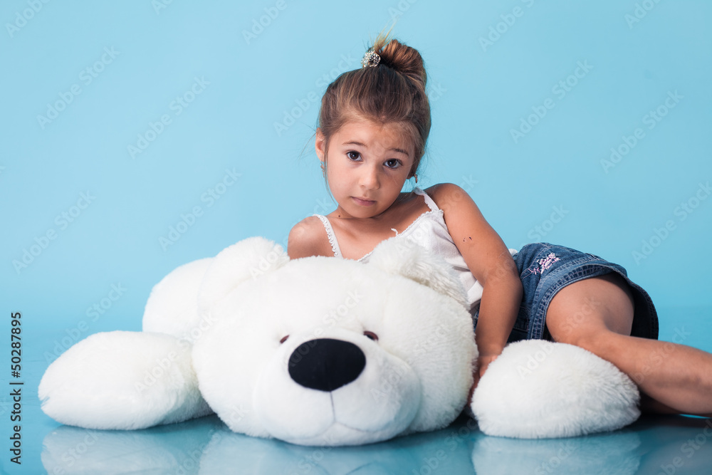 cute little girl on blue background cute little girl on blue background
