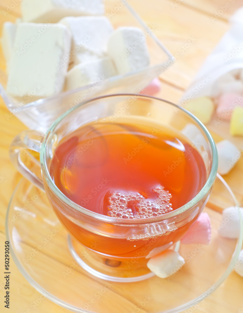 Fresh tea with candy