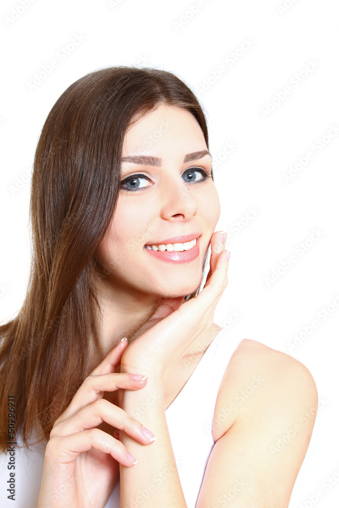 Beautiful smiling young woman stroking her clean beauty face - i