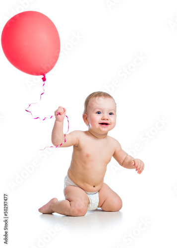 Smiling baby boy  with red ...