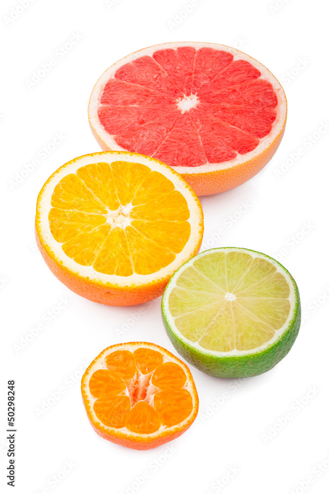 Half of fresh citrus fruits, isolated on white background Half of fresh citrus fruits, isolated on white background