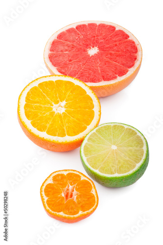 Half of fresh citrus fruits, isolated on white background