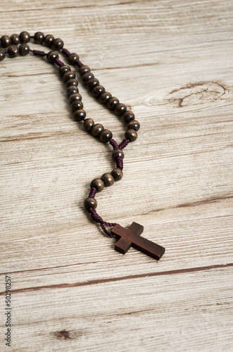 Old Crucifix on Wooden Background