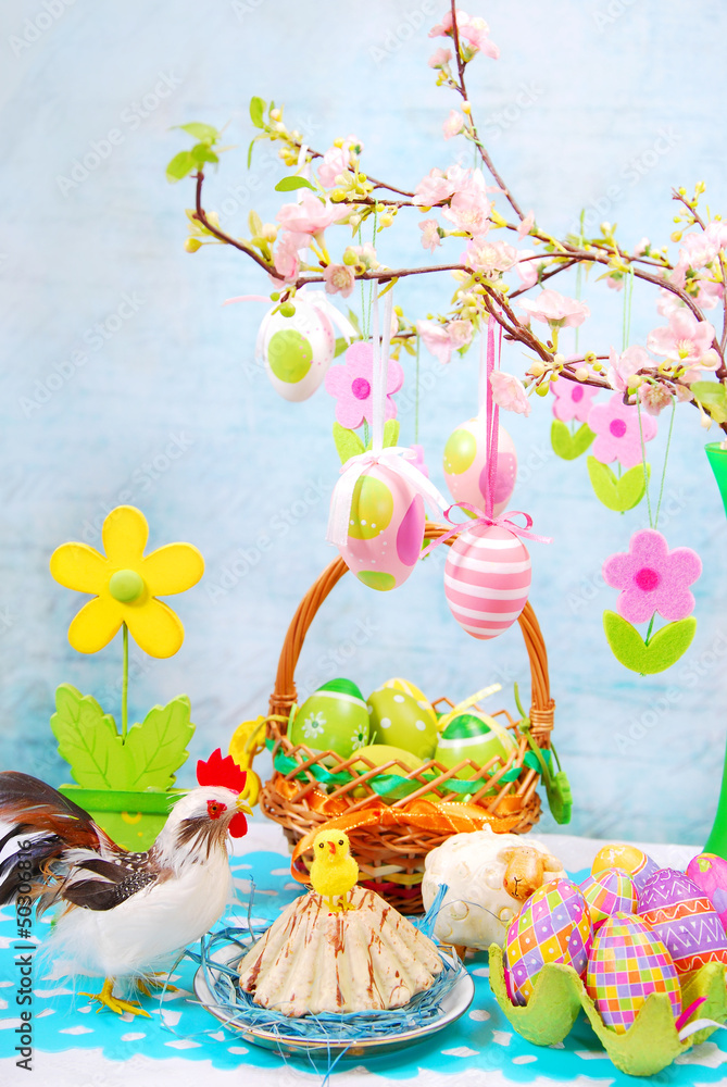easter table with colorful eggs decoration