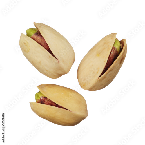Pistachios nuts isolated on white background, close up