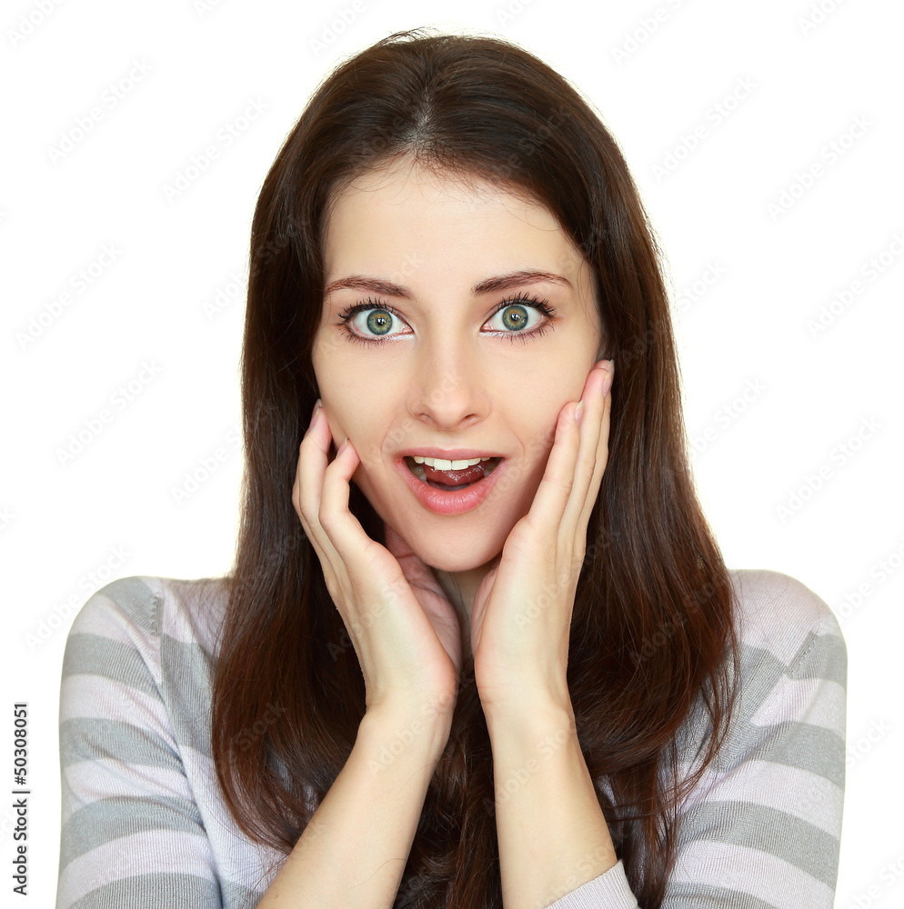 Surprising casual woman holding hands at face with opened mouth Surprising casual woman holding hands at face with opened mouth