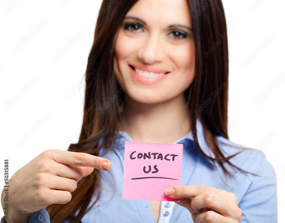 Businesswoman showing the words Contact Us Businesswoman showing the words Contact Us