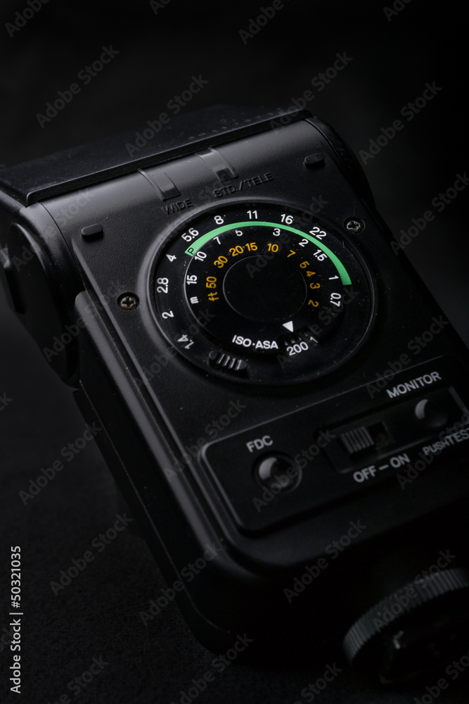 Macro shot of a flash control system of a camera Macro shot of a flash control system of a camera