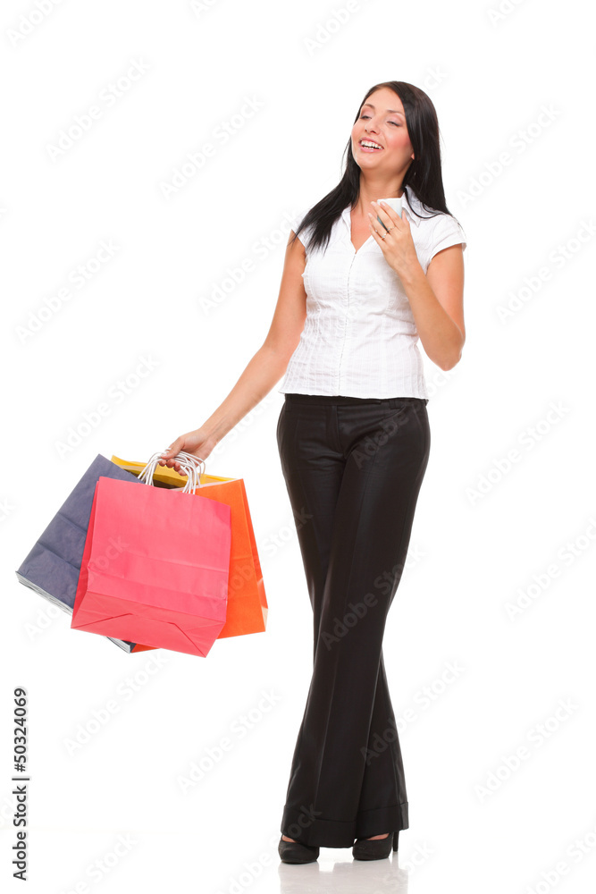 portrait cute young woman mobile phone while holding shopping ba