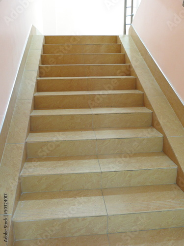 Empty stairway with tiled floor