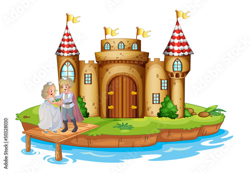 A prince and a princess at the wooden bridge near the castle