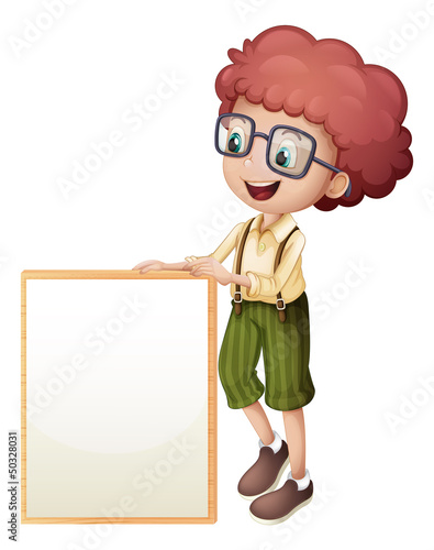 A young boy holding an empty frame