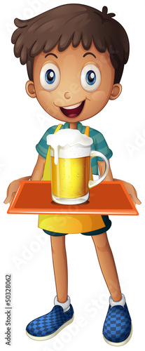 A young boy holding a tray with a mug of beer