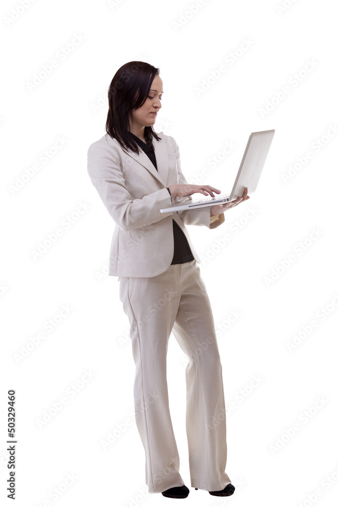 Businesswoman working on a laptop isolated over white full body Businesswoman working on a laptop isolated over white full body