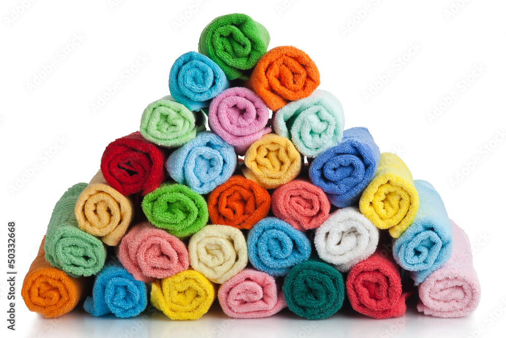 Set of colored towels on white. Set of colored towels on white.