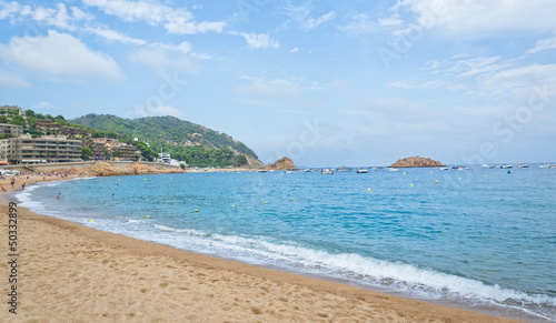 Beautiful tropical beach with people swimming © eternalfeelings