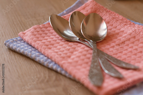 spoon lying on a towel © Konyakhina Daria