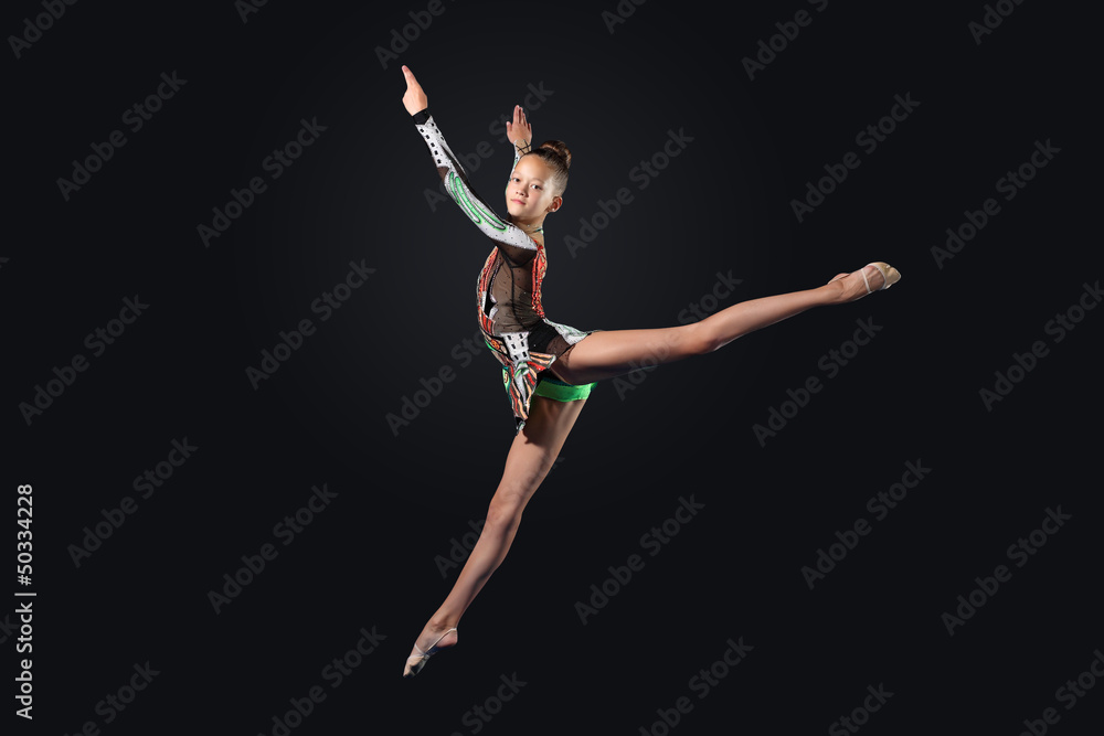 Young woman in gymnast suit posing Young woman in gymnast suit posing
