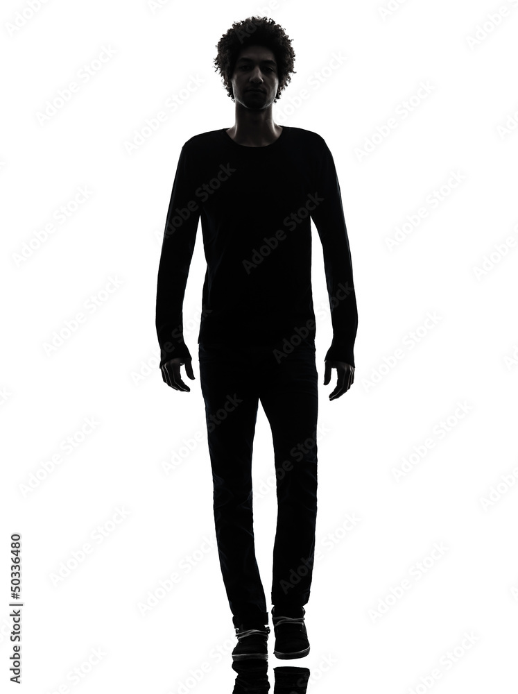 Fototapeta premium handsome african young man walking silhouette