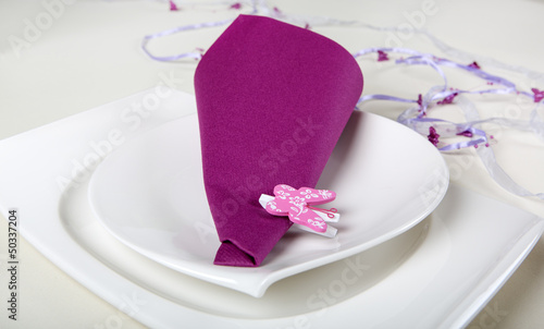Element of table set decoration in purple