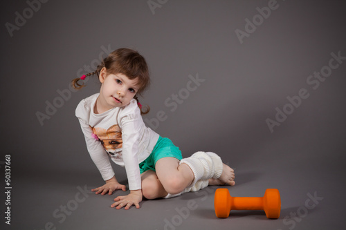 little girl on gray background