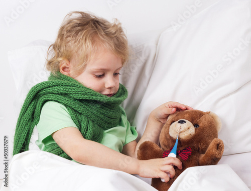 sick girl and teddy bear