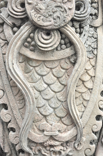 Closed up texture on stutue in wat pho © khuntapol
