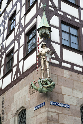 Saint George statue at Pilatushaus, Nuremberg, Germany photo