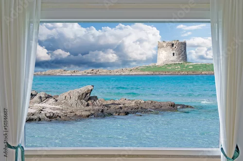 Fototapeta chmury nad la pelosa i oknem