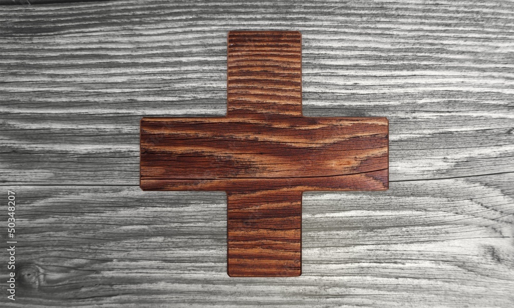 wooden cross symbol in a stylish background