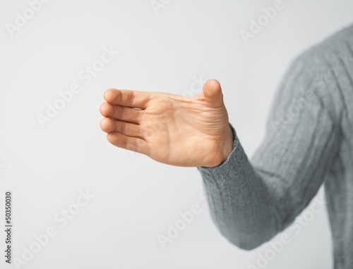 Photography man holding imaginary object