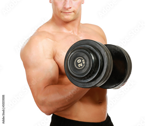 Handsome muscular man working out