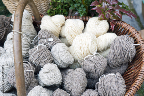 Wicker basket with balls of wool