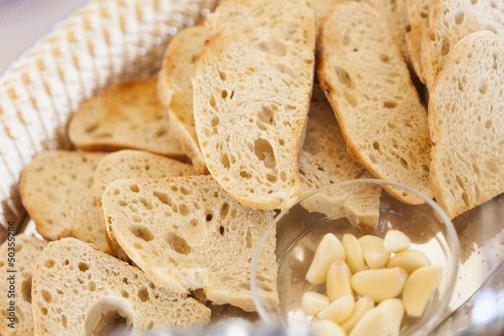 Tray of Fresh Made Sourdough Bread with Garlic Cloves Tray of Fresh Made Sourdough Bread with Garlic Cloves
