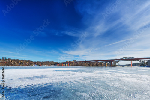 Ice covered water and the bridge over to Stockholm © stefanholm