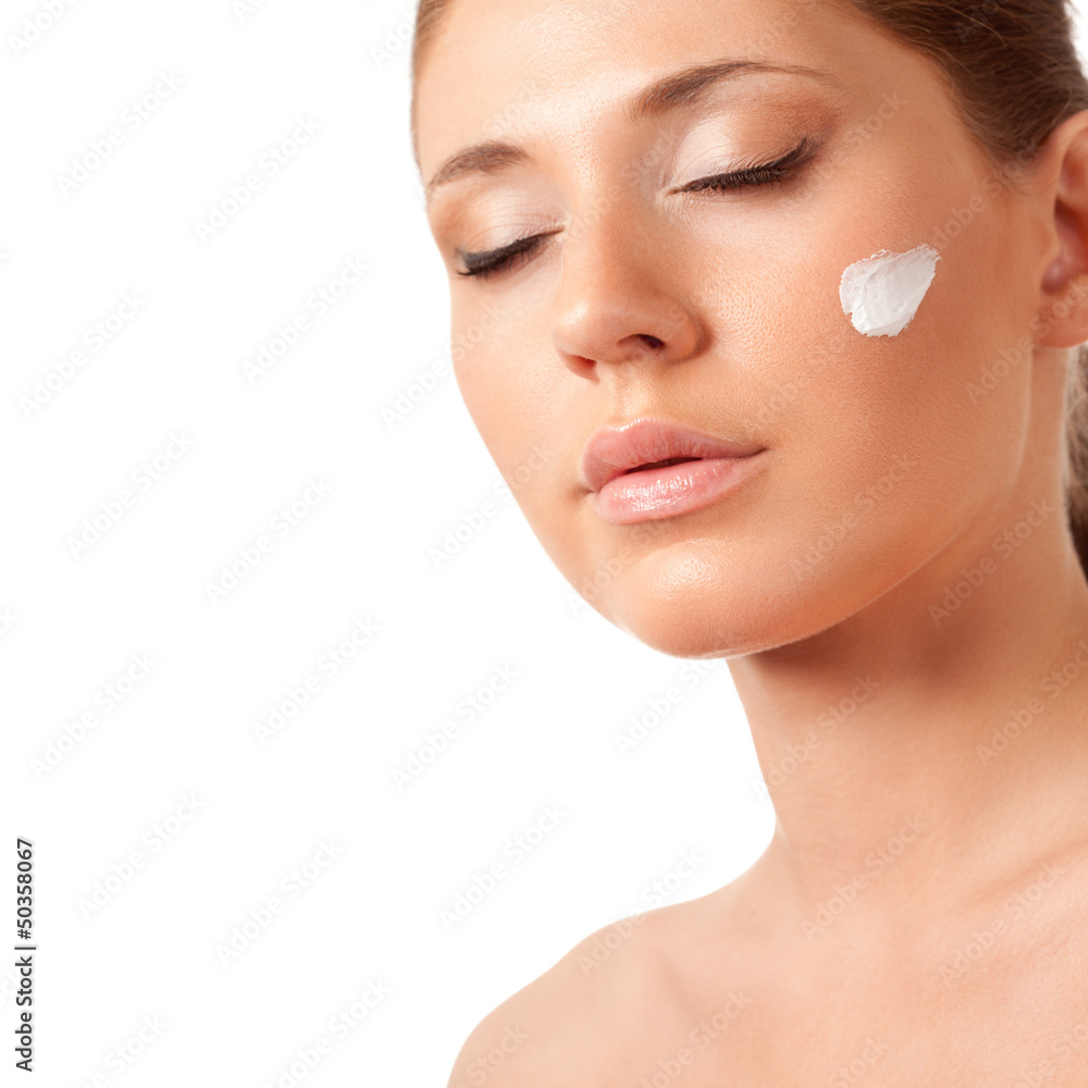 Obraz premium beautiful woman face with cream