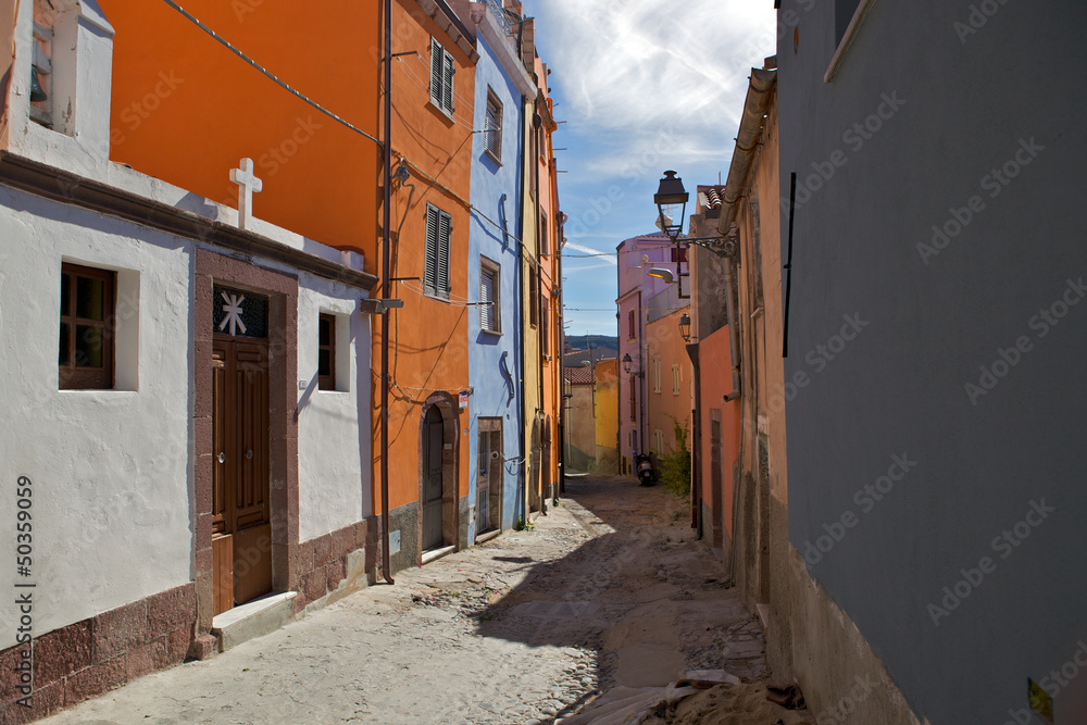 Colourful street in Sa Costa, Bosa, Sardinia, Italy