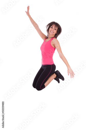 Weight loss fitness woman jumping of joy
