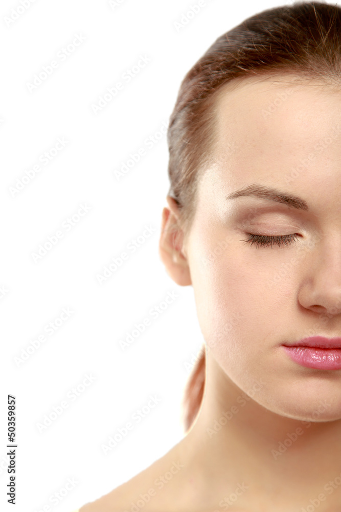 A part of a beautiful female face isolated on white background A part of a beautiful female face isolated on white background