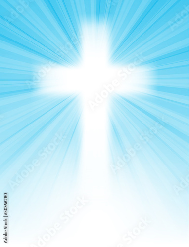 cross on blue sky, with sun rays