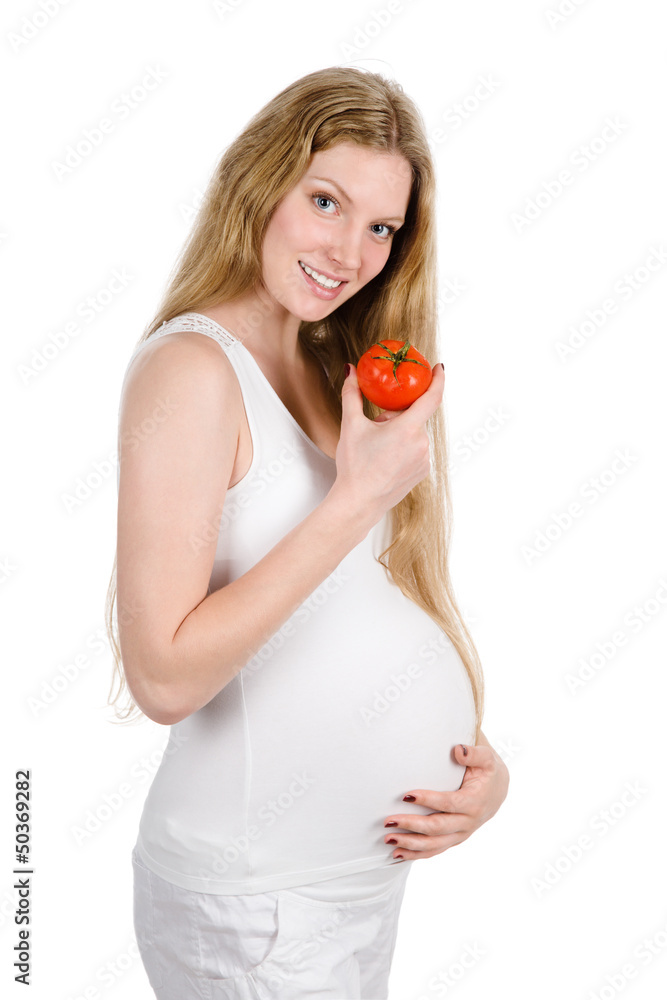 Healthy pregnant lady with tomato. isolated on white Healthy pregnant lady with tomato. isolated on white