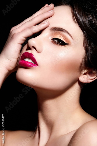 sexy model hwit bright makeup  with red lips  with perfect skin