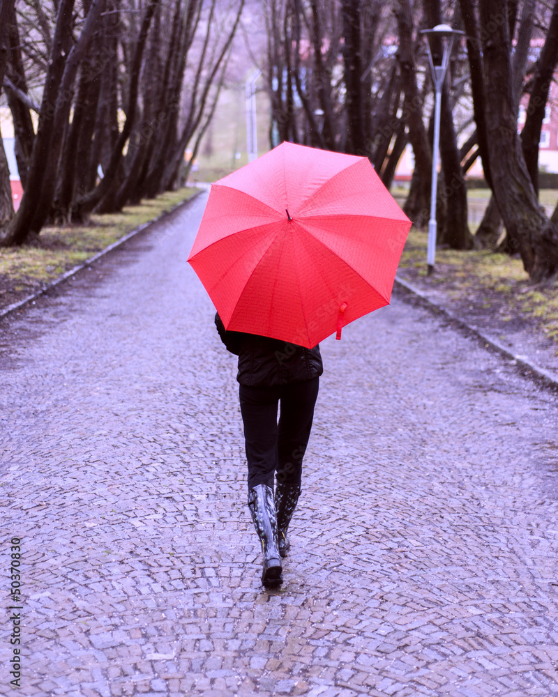 Girl Walking Away With Umbrella