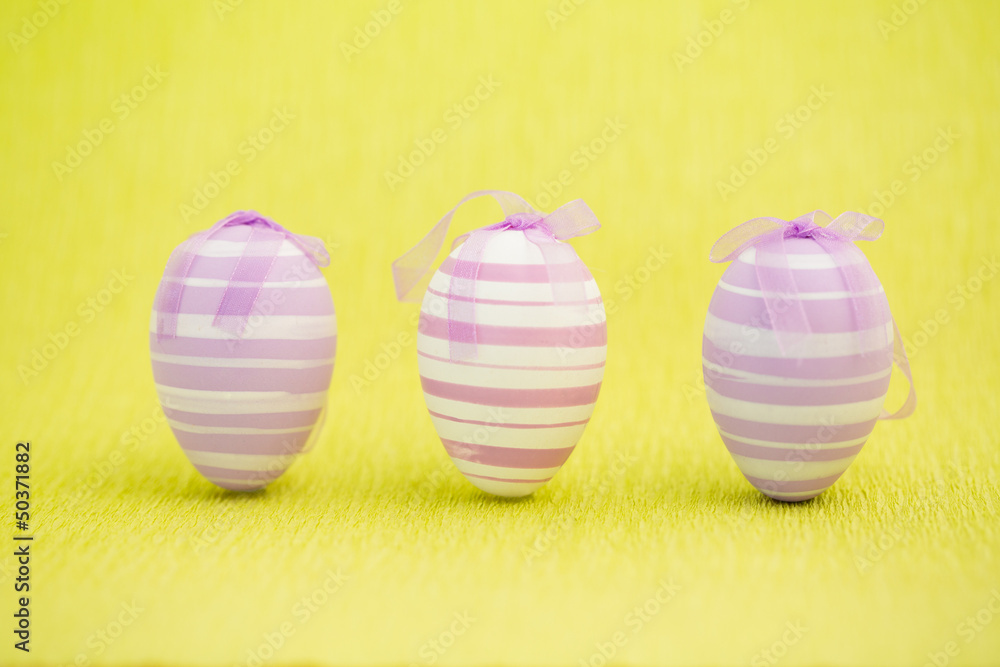 Purple easter eggs standing