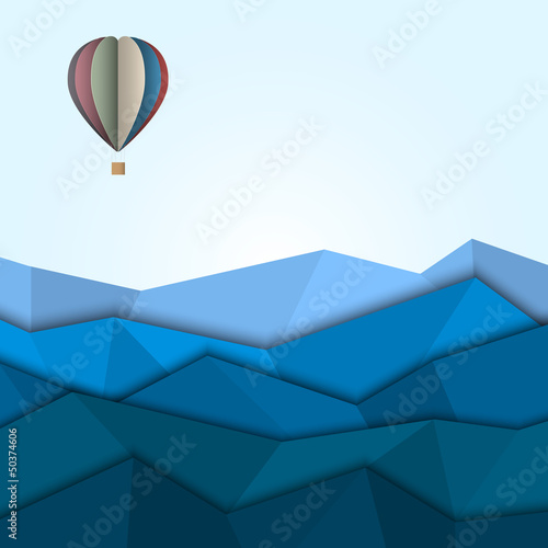 Hot air balloon and mountains from paper