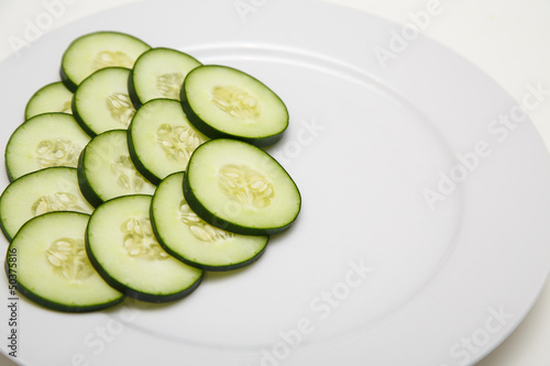 Sliced Cucumbers on a White Plate