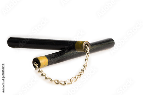 Black nunchaku nunchucks isolated on white photo