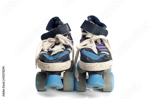 Quadro em tela old blue rollerblades isolated on white background