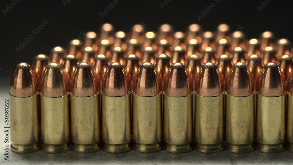 Macro shot of 9 mm handgun Bullets. Dollies to the right Macro shot of 9 mm handgun Bullets. Dollies to the right